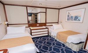 1734702204748interior-stateroom.jpg